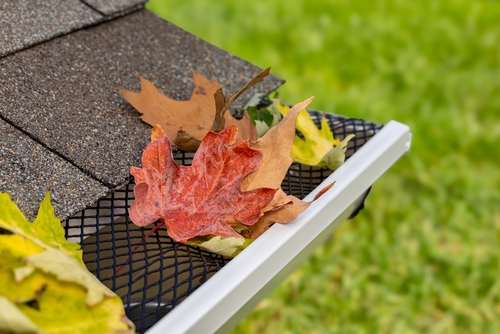 Residential property with gutter protection and maintained exterior drainage in Seymour, IN